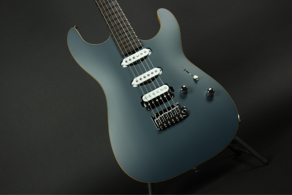 Saito Guitars electric guitar with matte blue finish, S-style body shape, three single-coil pickups, tremolo bridge,