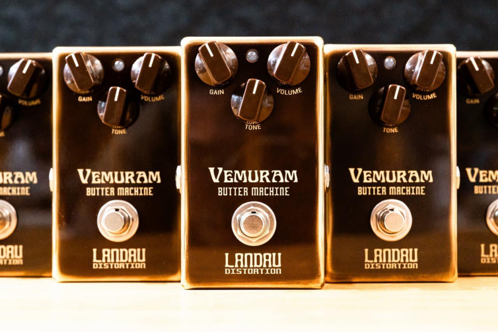 Vemuram Butter Machine Landau Distortion guitar pedals with gain, tone, and volume controls in a gold finish, displayed side by side.