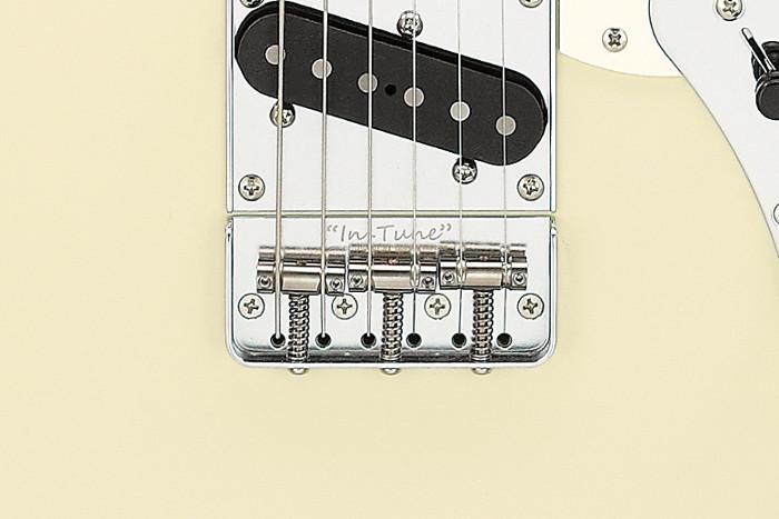 Ibanez FLATV2 bridge close-up with Gotoh F1803 and In-Tune saddles