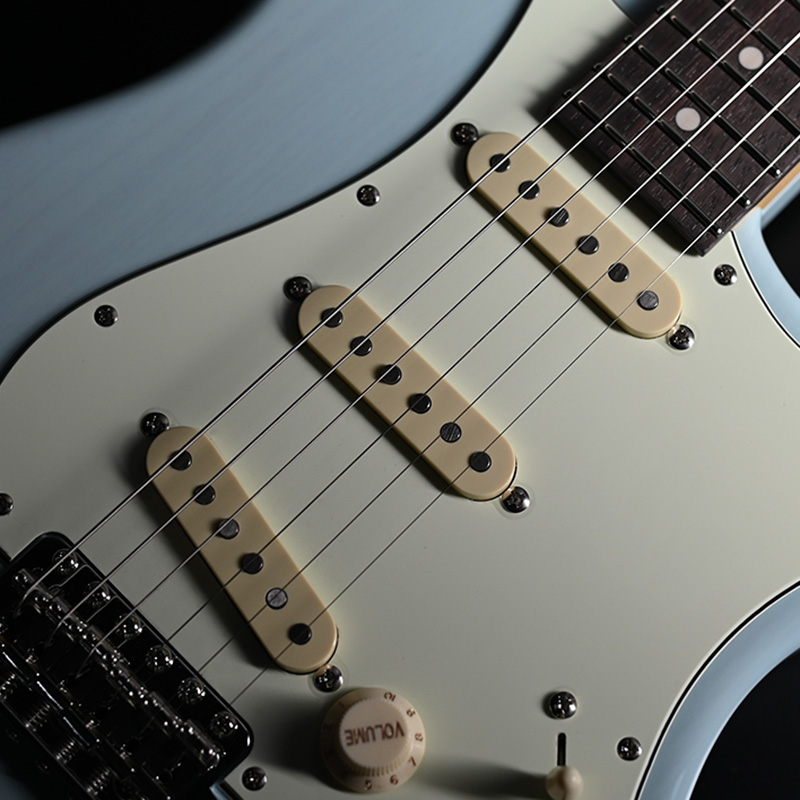 Close-up of Momose's new Awake single-coil pickups on a sonic-blue Strat-type body