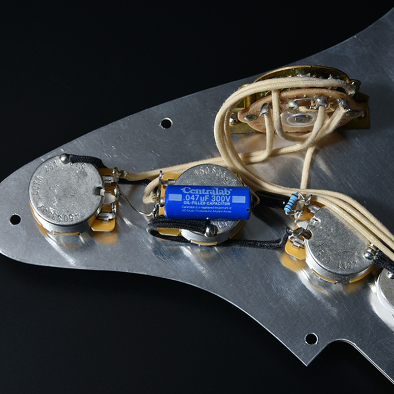 Momose wiring harness with a Centralab oil-filled capacitor and cloth wiring behind the pickguard