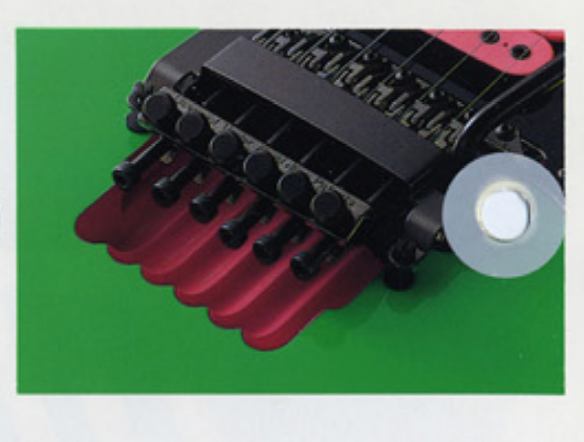 Ibanez JEM lion’s claw tremolo cavity routing behind floating bridge