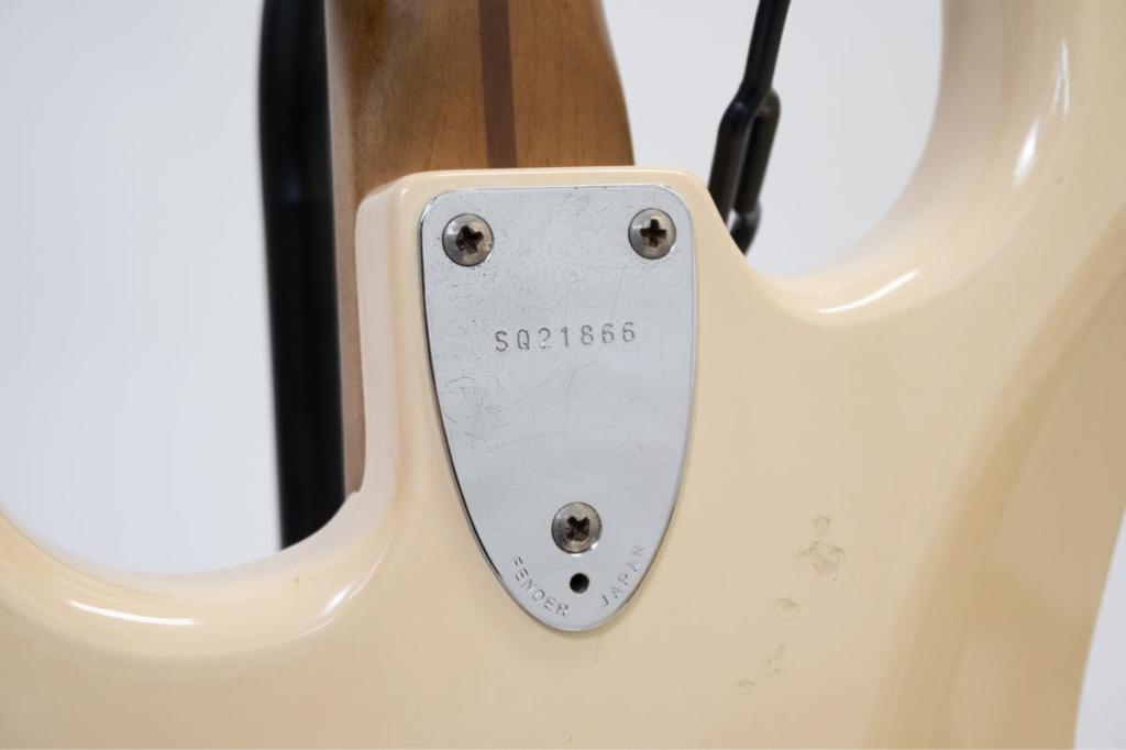 Squier SQ Series neck plate serial number Fender Japan 1980s three bolt neck