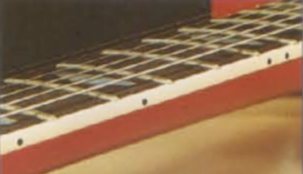 Yamaha SG2000 over-binding frets close-up showing extended fret width to prevent string slip