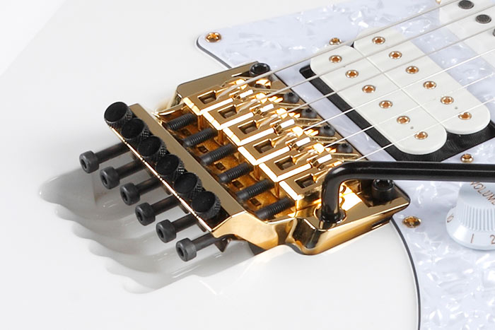 Ibanez Edge tremolo bridge with gold hardware used on RG series electric guitars