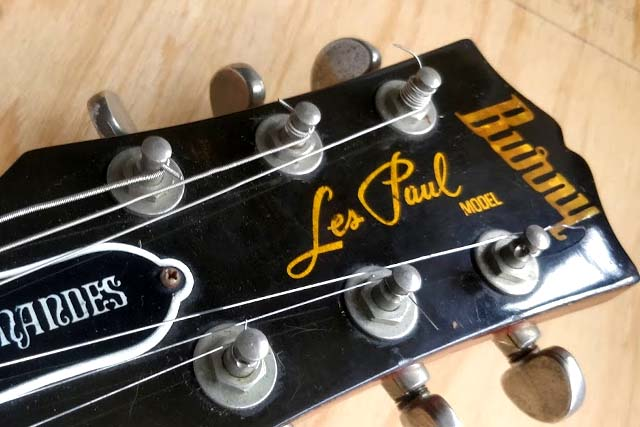 Burny headstock with gold Les Paul Model lettering, 1975 to 1978
