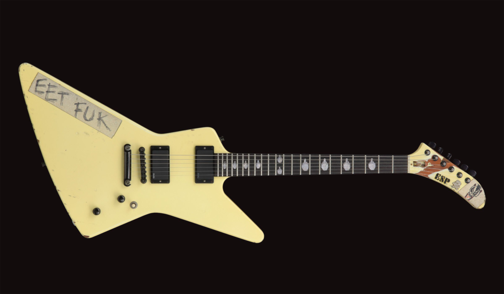 James Hetfield's first ESP guitar, the white EET FUK MX-220 Explorer